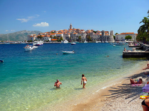 Pebble beach Ispod Duvana with beautiful view of the old town of Korcula