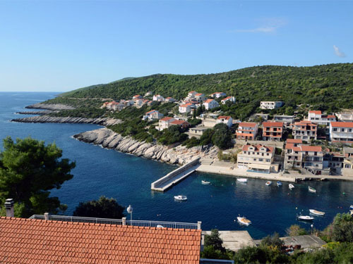 Large stone pier in the port of Zavalatica